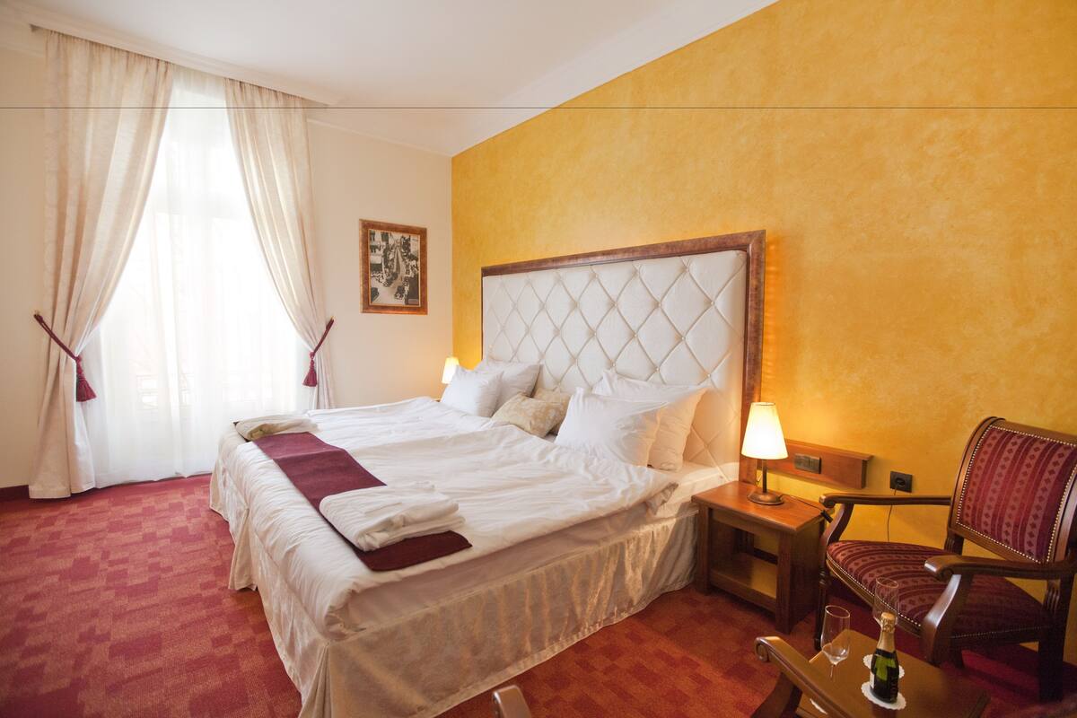Deluxe Double Room | Minibar, desk, blackout drapes, iron/ironing board (on request)