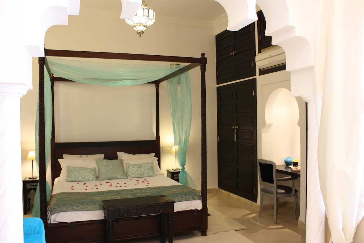 Suite Deluxe | Ropa de cama de alta calidad y minibar
