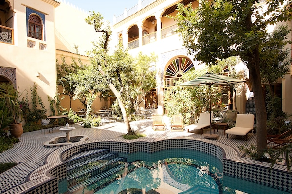 Seasonal outdoor pool, pool umbrellas