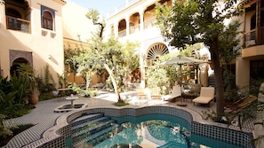Seasonal outdoor pool, pool umbrellas