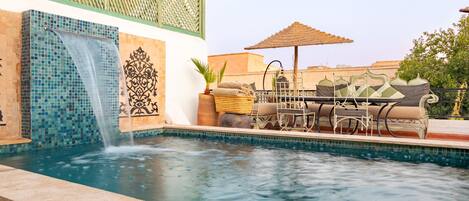 Outdoor pool, sun loungers