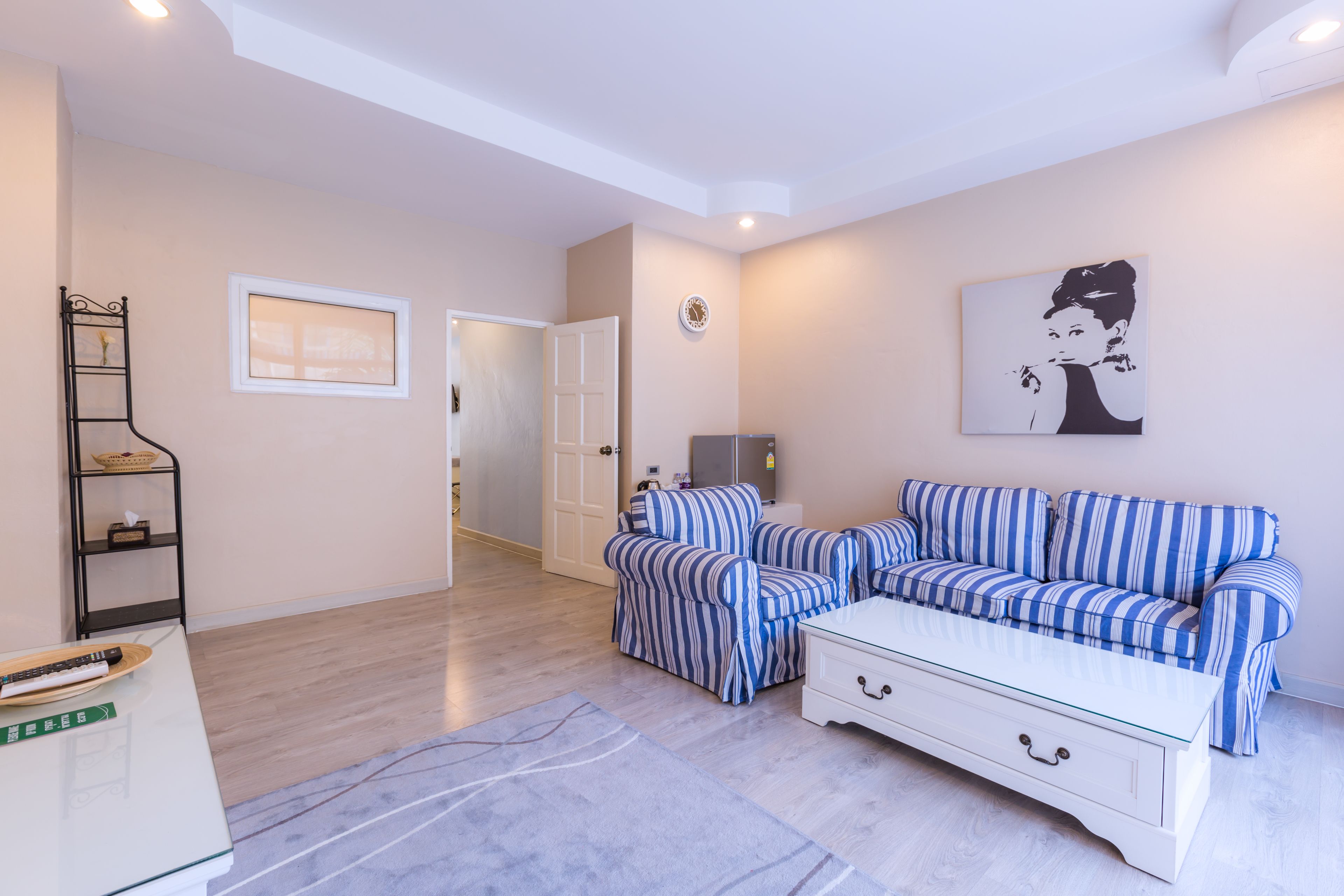 suite, pool view | living area | flat-screen tv