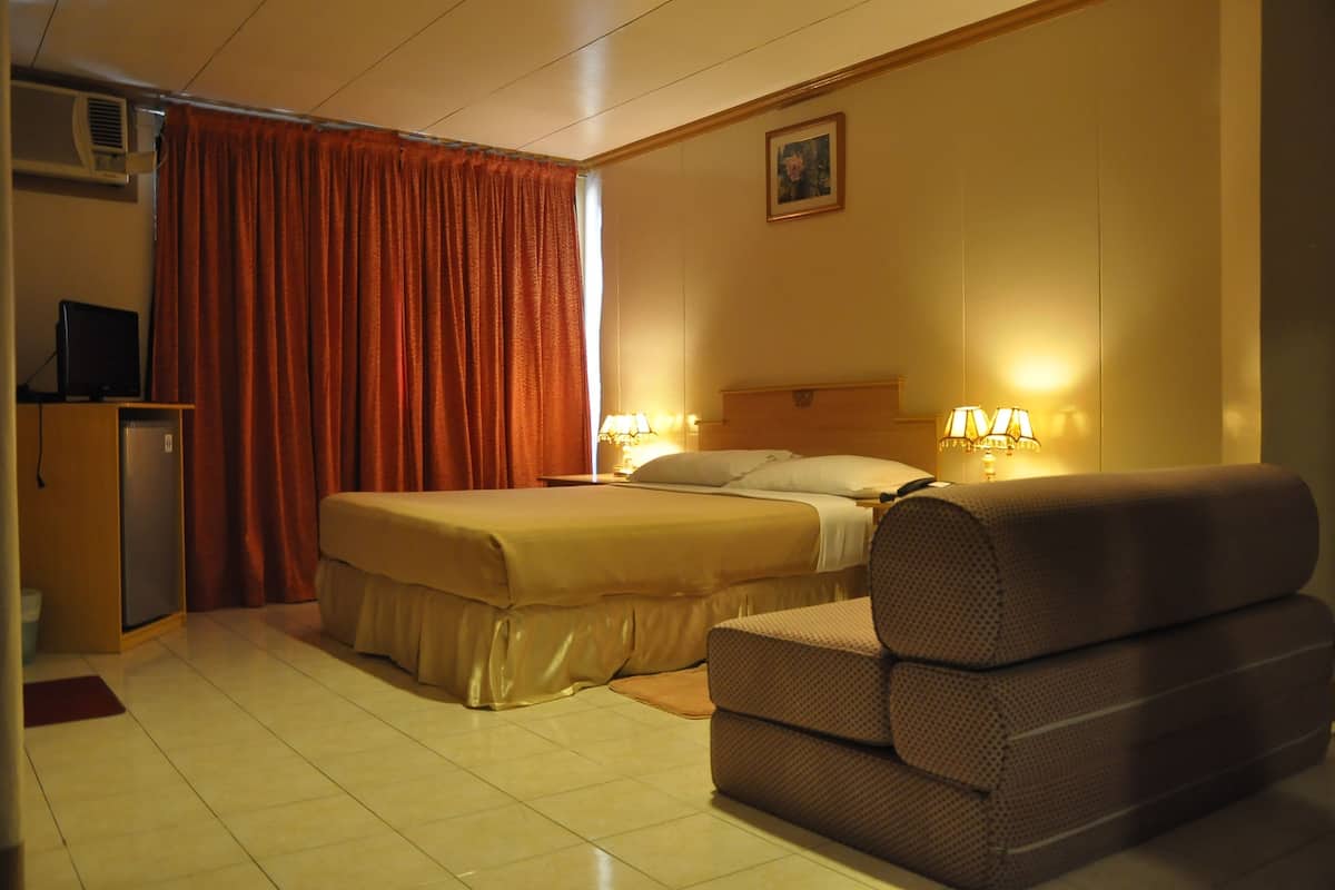 Suite Junior | Seprai premium, brankas, meja kerja, dan Wi-Fi gratis