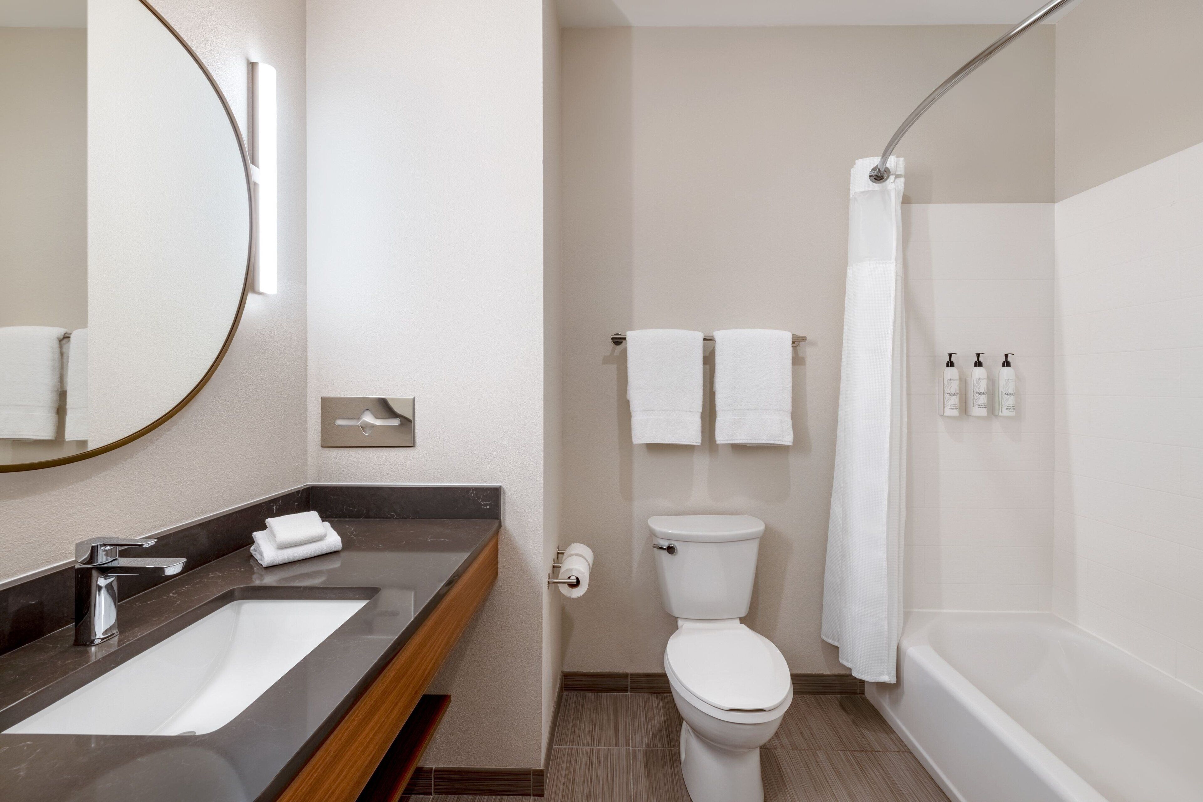 combined shower/bathtub, hair dryer, towels, soap