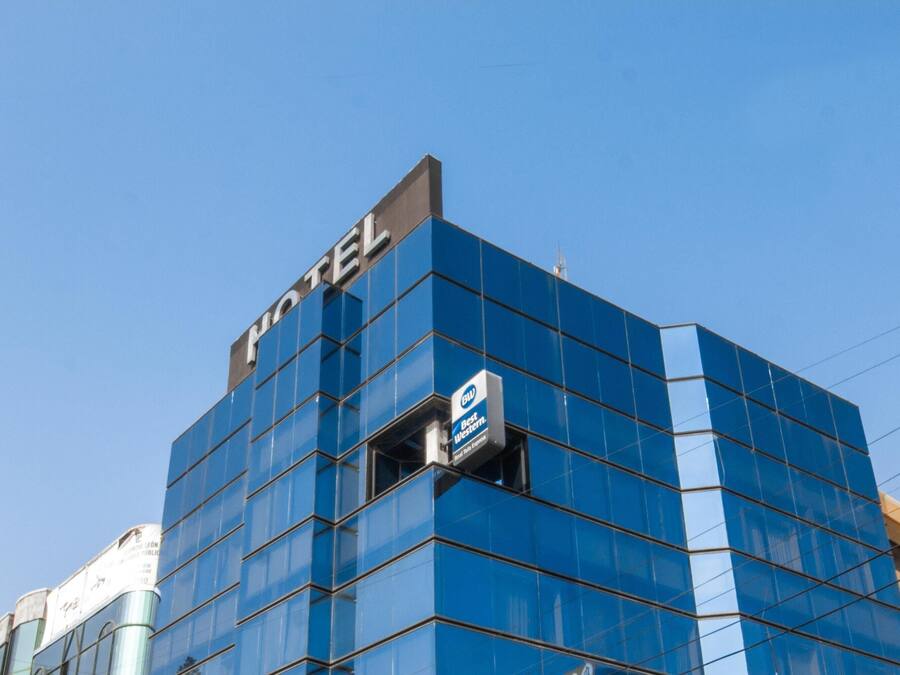 A hotel building with a prominent 'HOTEL' sign on the facade.