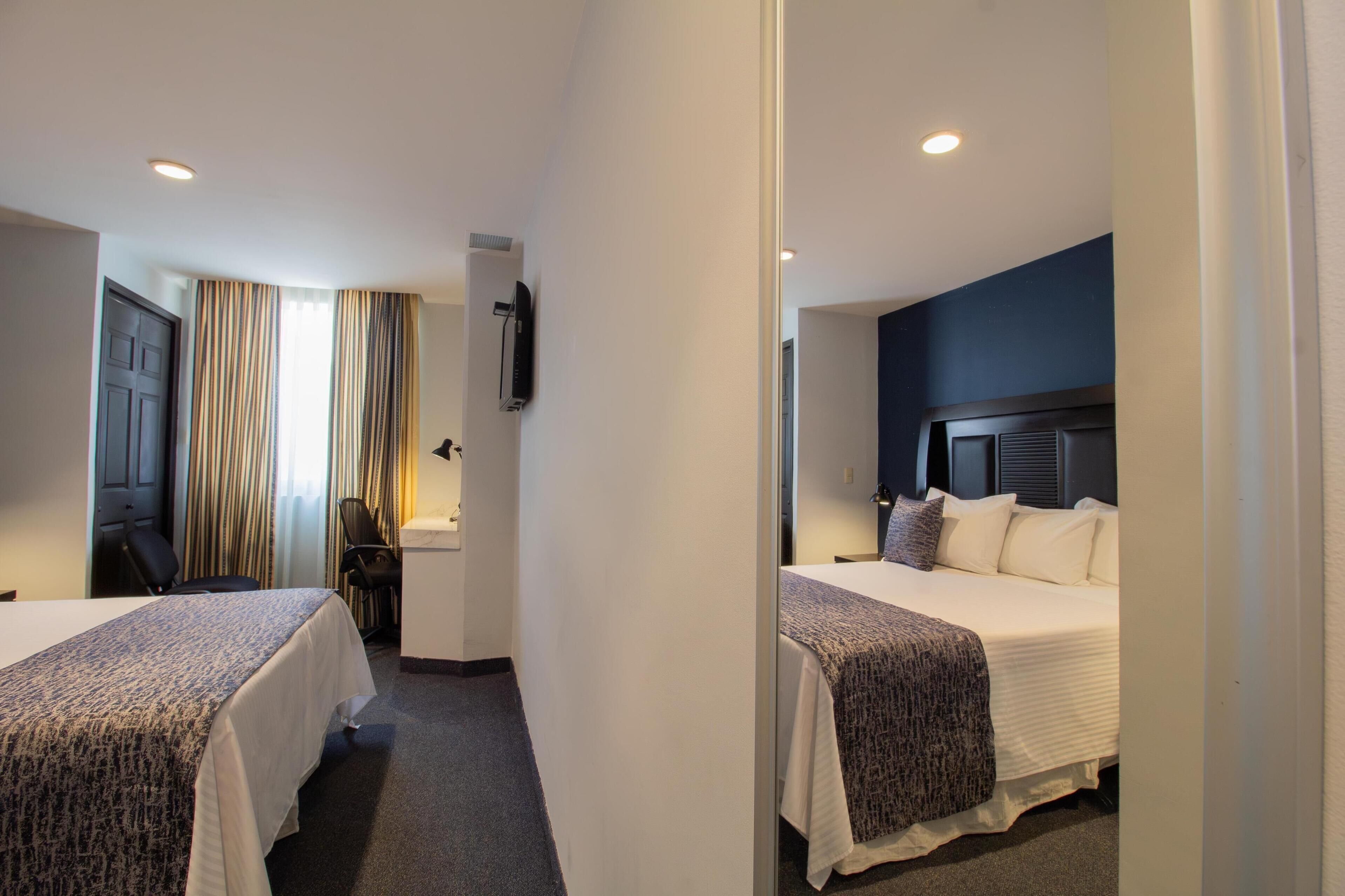 standard room, 1 queen bed, non smoking | minibar, desk, iron/ironing board, bed sheets