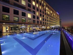 Rooftop bar, pool views, open daily