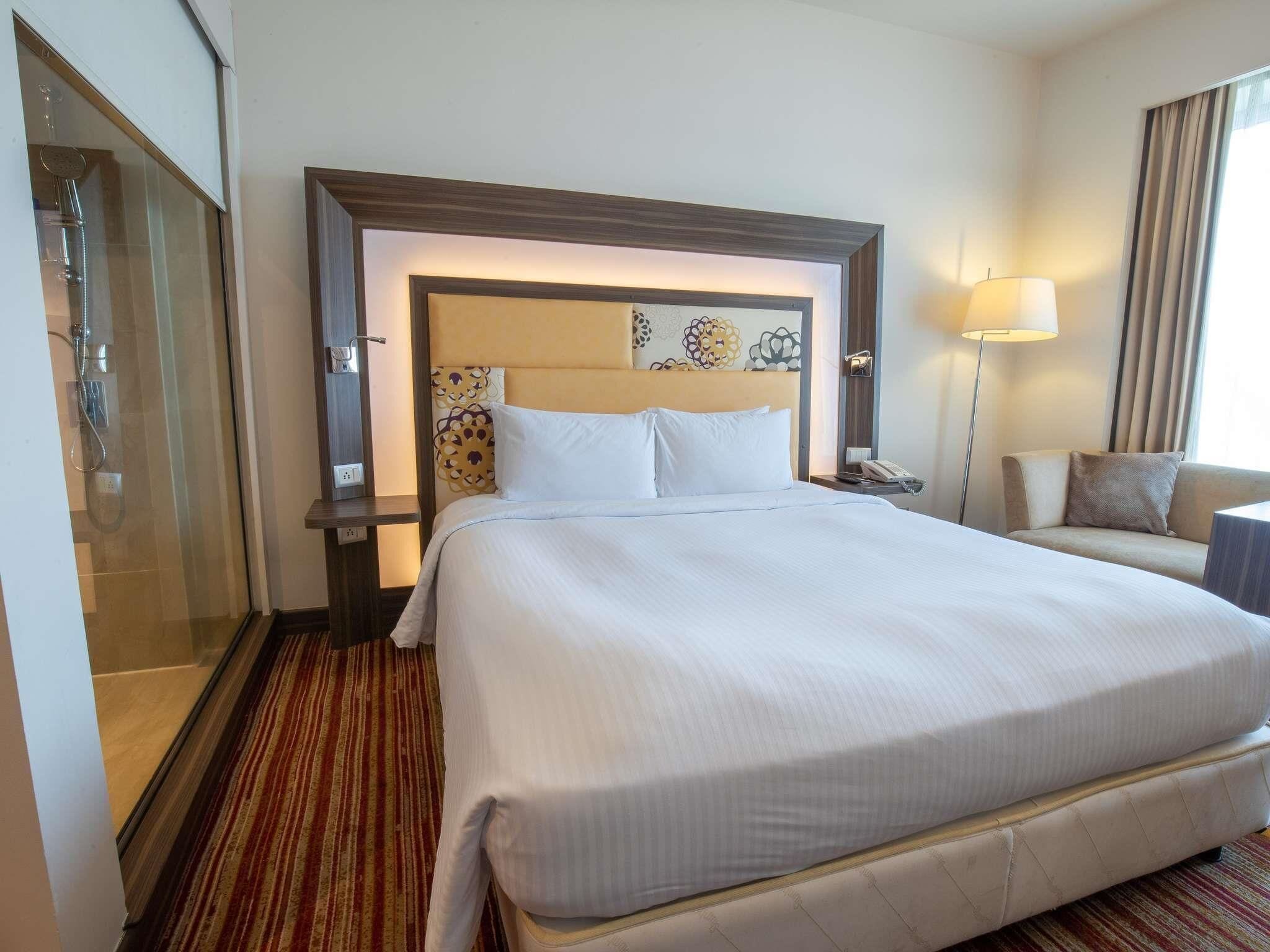Chambre Exécutive, 1 très grand lit | Literie de qualité supérieure, minibar, coffres-forts dans les chambres