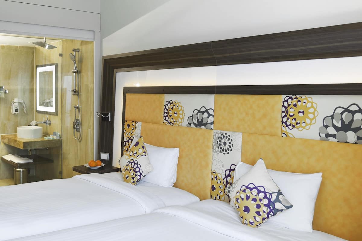 Ropa de cama de alta calidad y minibar
