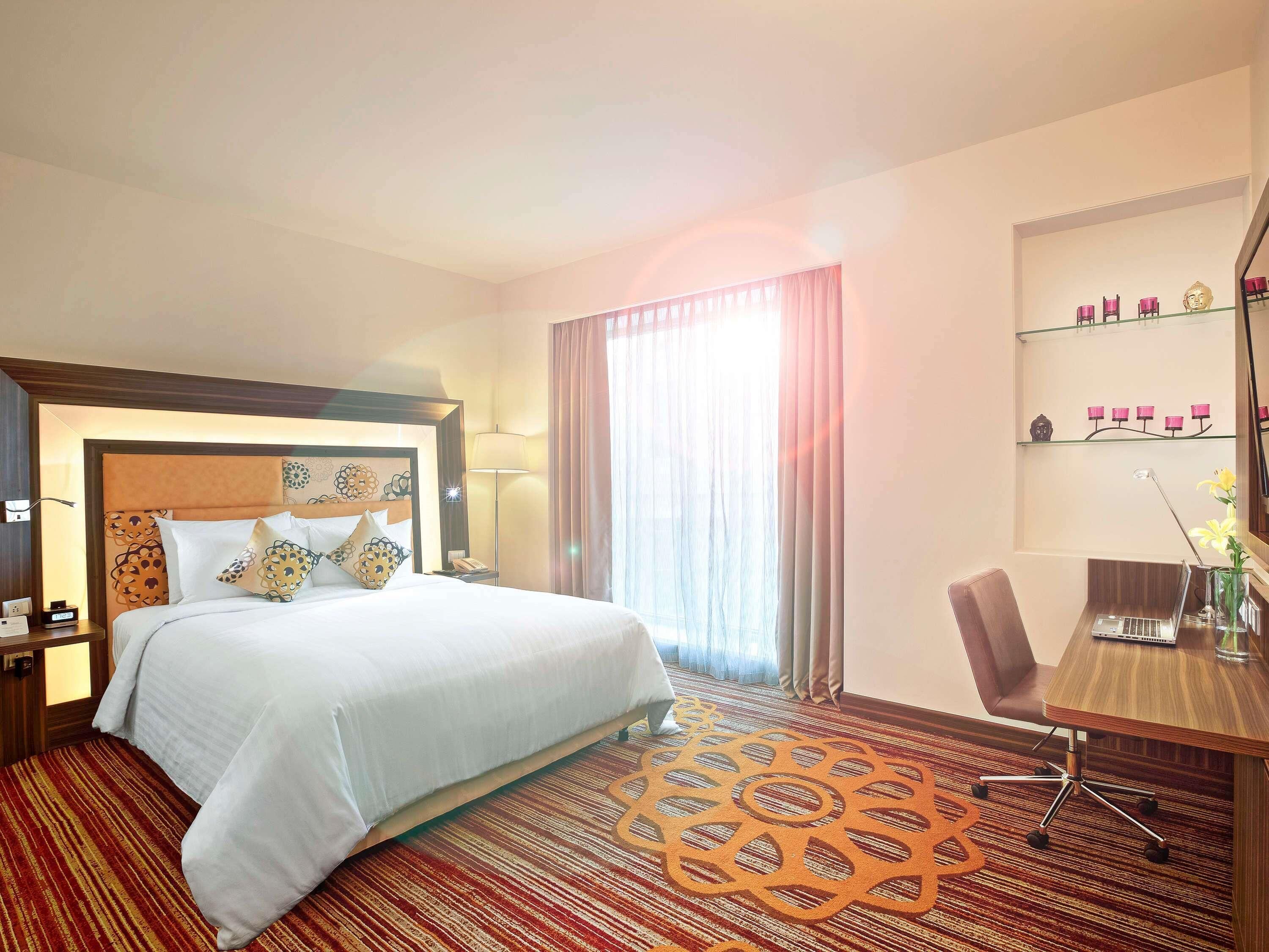 Chambre Deluxe, 1 très grand lit | Literie de qualité supérieure, minibar, coffres-forts dans les chambres