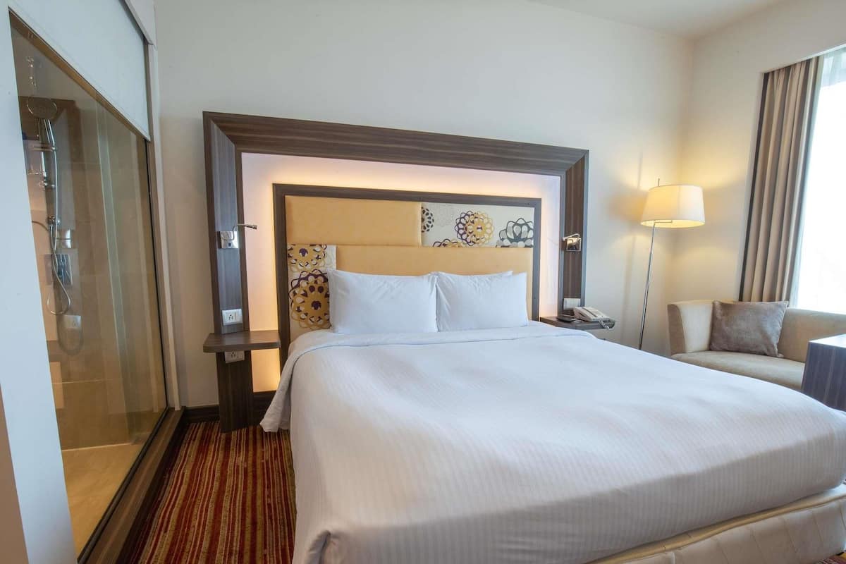 Chambre exécutive, 1 trÚs grand lit | Literie de qualité, minibar, coffre-fort, bureau