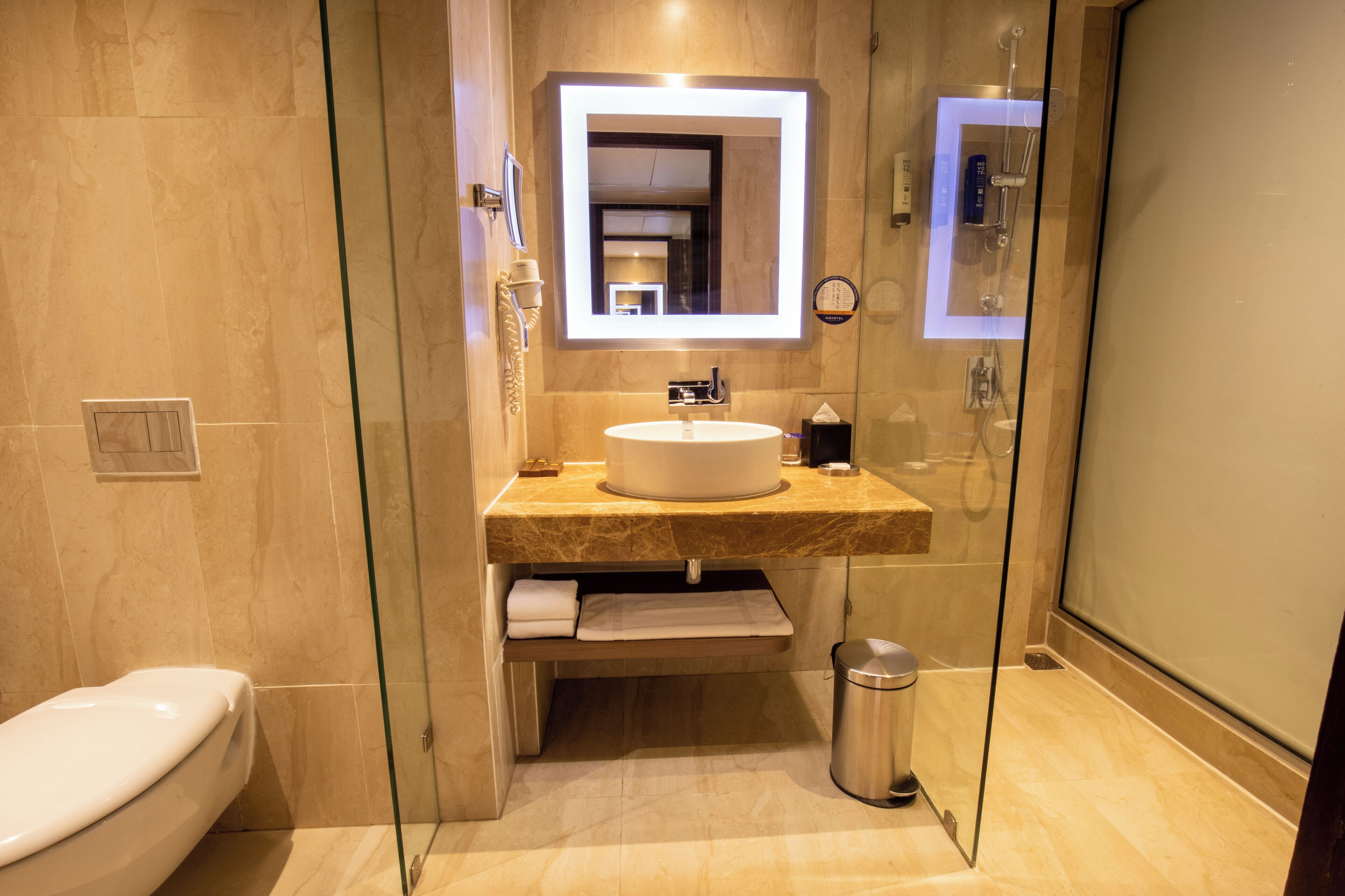 Shower, rainfall showerhead, designer toiletries, hair dryer