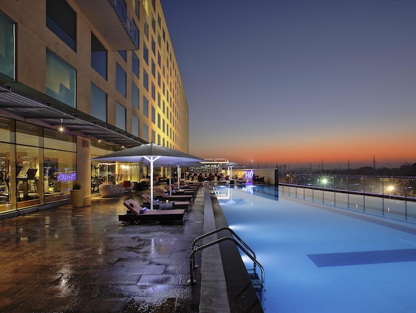 Rooftop bar, poolside views, open daily