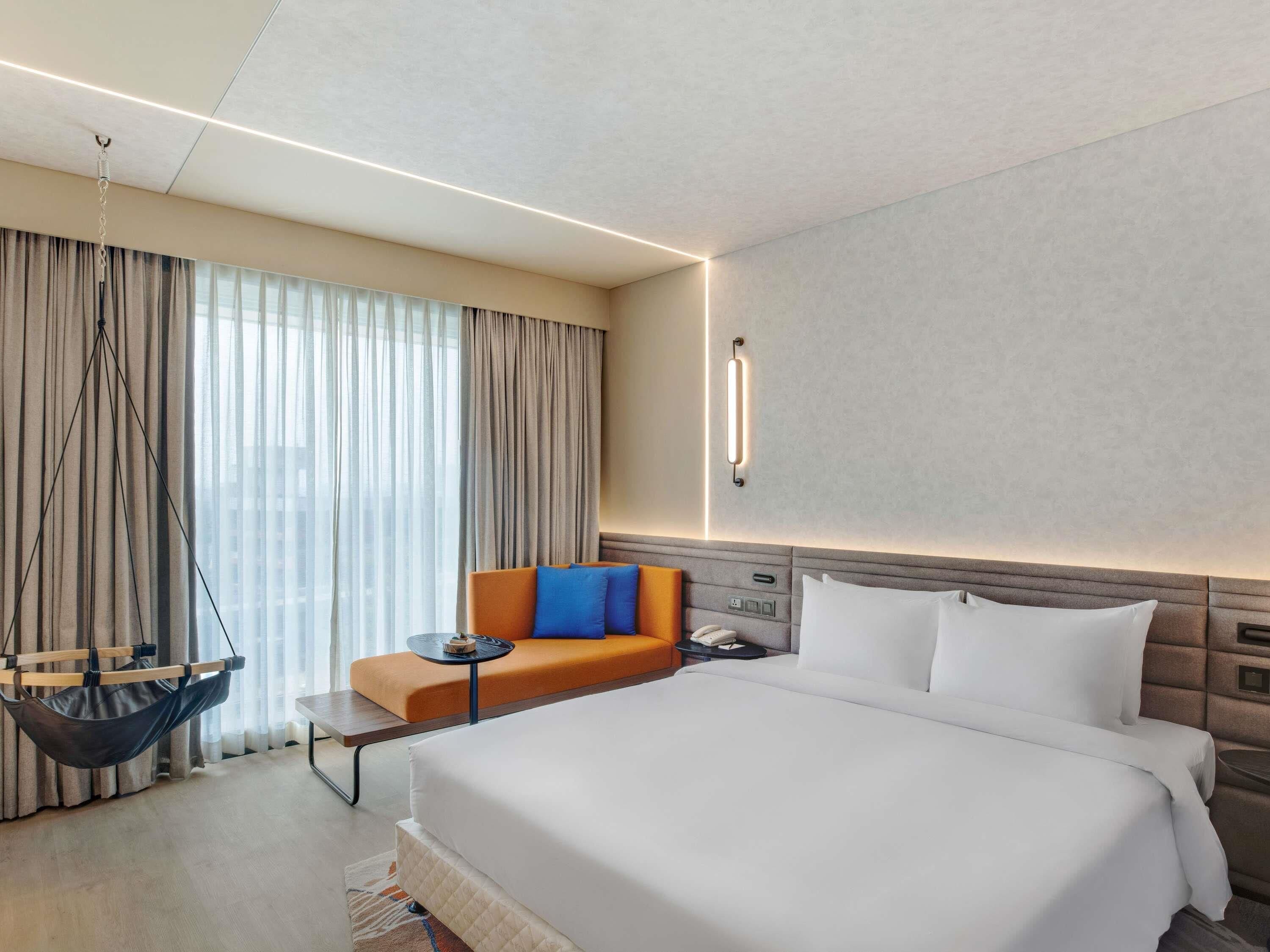 Chambre « Premier », 1 lit double | Literie de qualité supérieure, minibar, coffres-forts dans les chambres