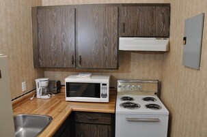 Standard Room, 2 Queen Beds | Private kitchen | Full-size fridge, microwave, oven, stovetop