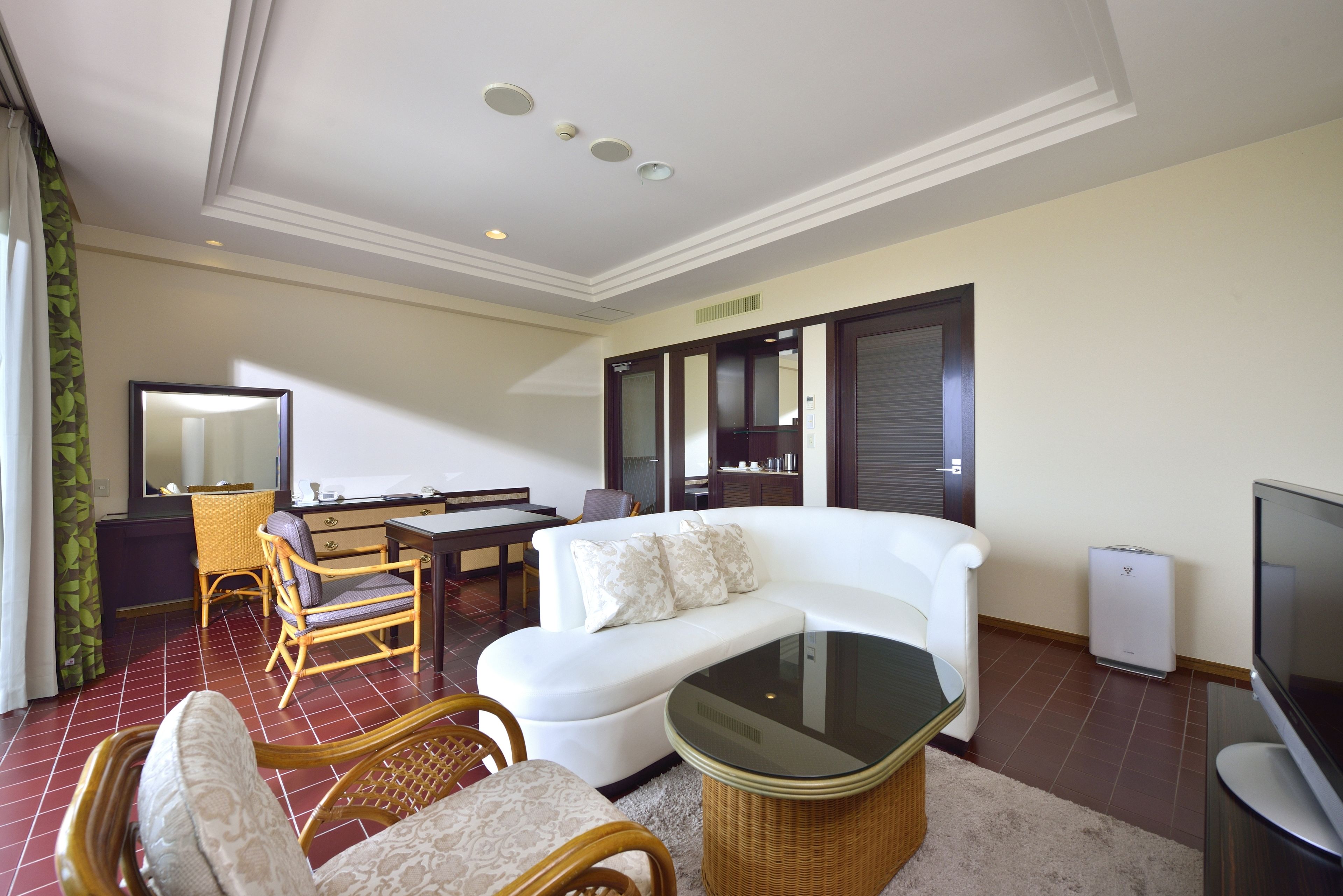 premium twin room | living area | lcd tv