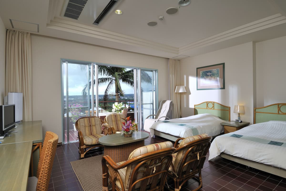 deluxe room, ocean view | living area | lcd tv