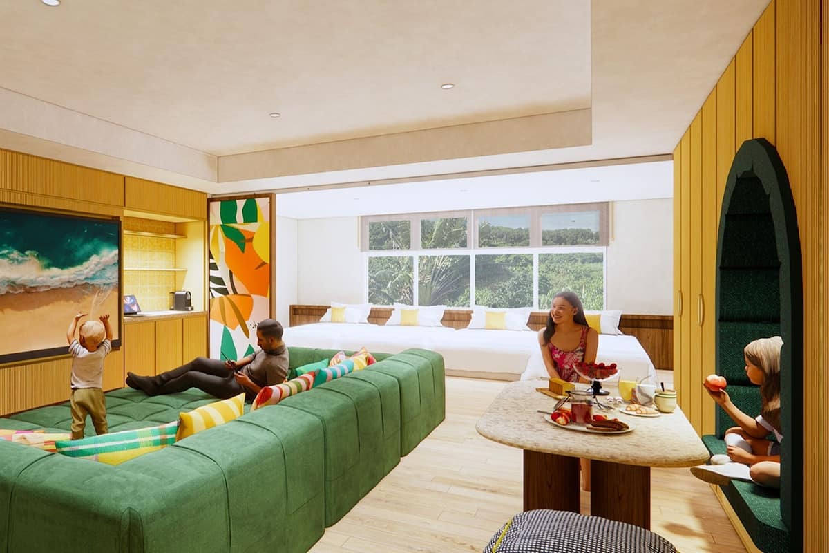 A modern living room with a green sofa, a large painting, and a view of greenery outside.