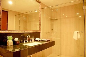 Shower, free toiletries, slippers, towels