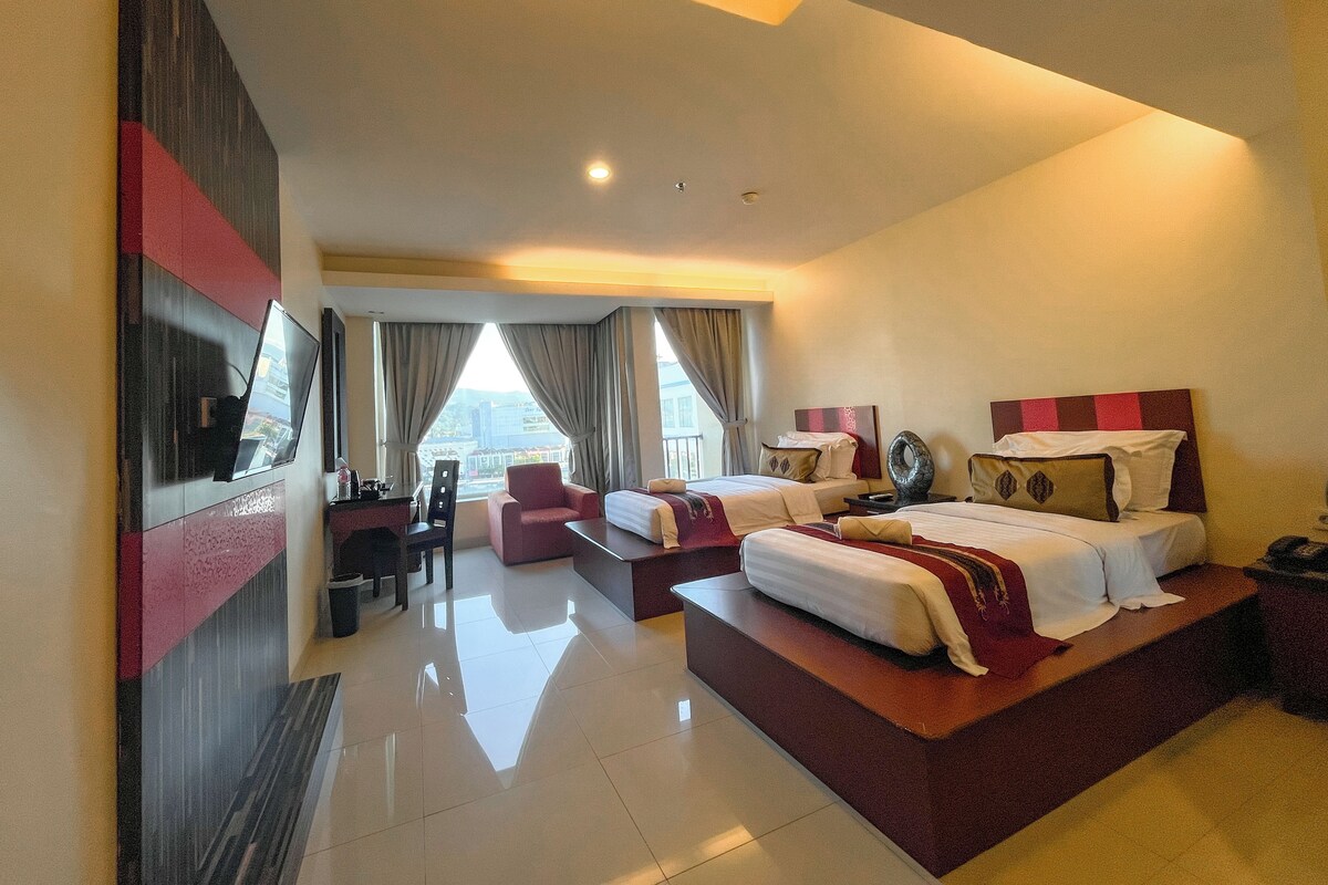 Deluxe Room, City View | In-room safe, desk, WiFi (free), bed sheets