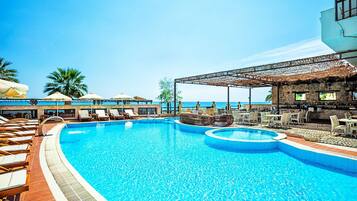 Outdoor pool, pool umbrellas, pool loungers