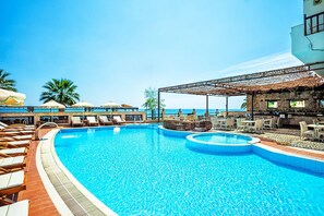 Outdoor pool, pool umbrellas, pool loungers