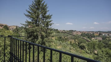 Family Quadruple Room, Balcony, Valley View | Cots/infant beds, rollaway beds, free WiFi, bed sheets