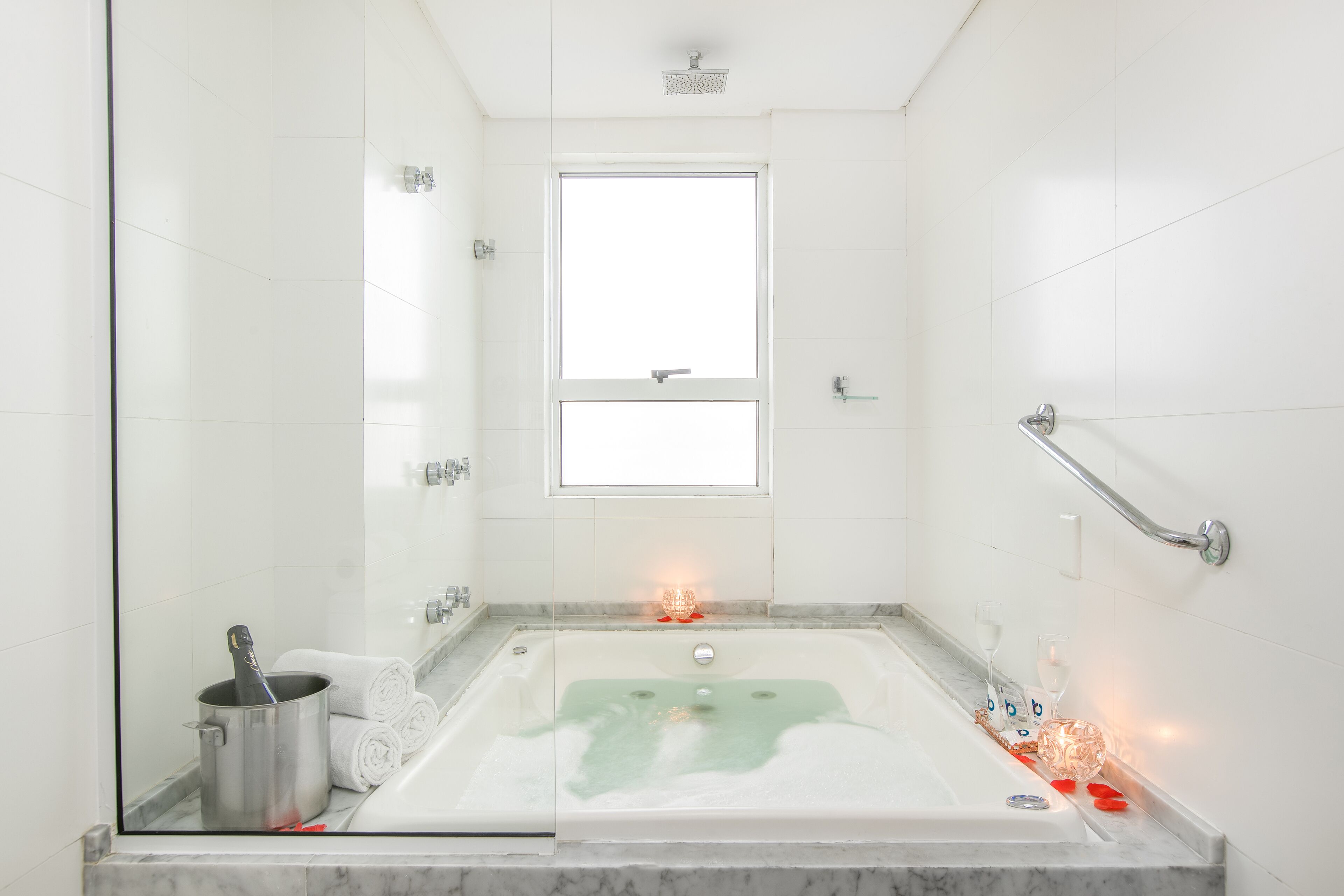 premium suite, hot tub, ocean view | bathroom | shower, hair dryer, towels