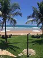 On the beach, sun loungers, beach umbrellas, beach towels