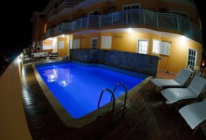 Outdoor pool, pool umbrellas, pool loungers