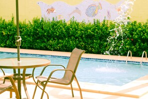 Outdoor pool, pool umbrellas, pool loungers