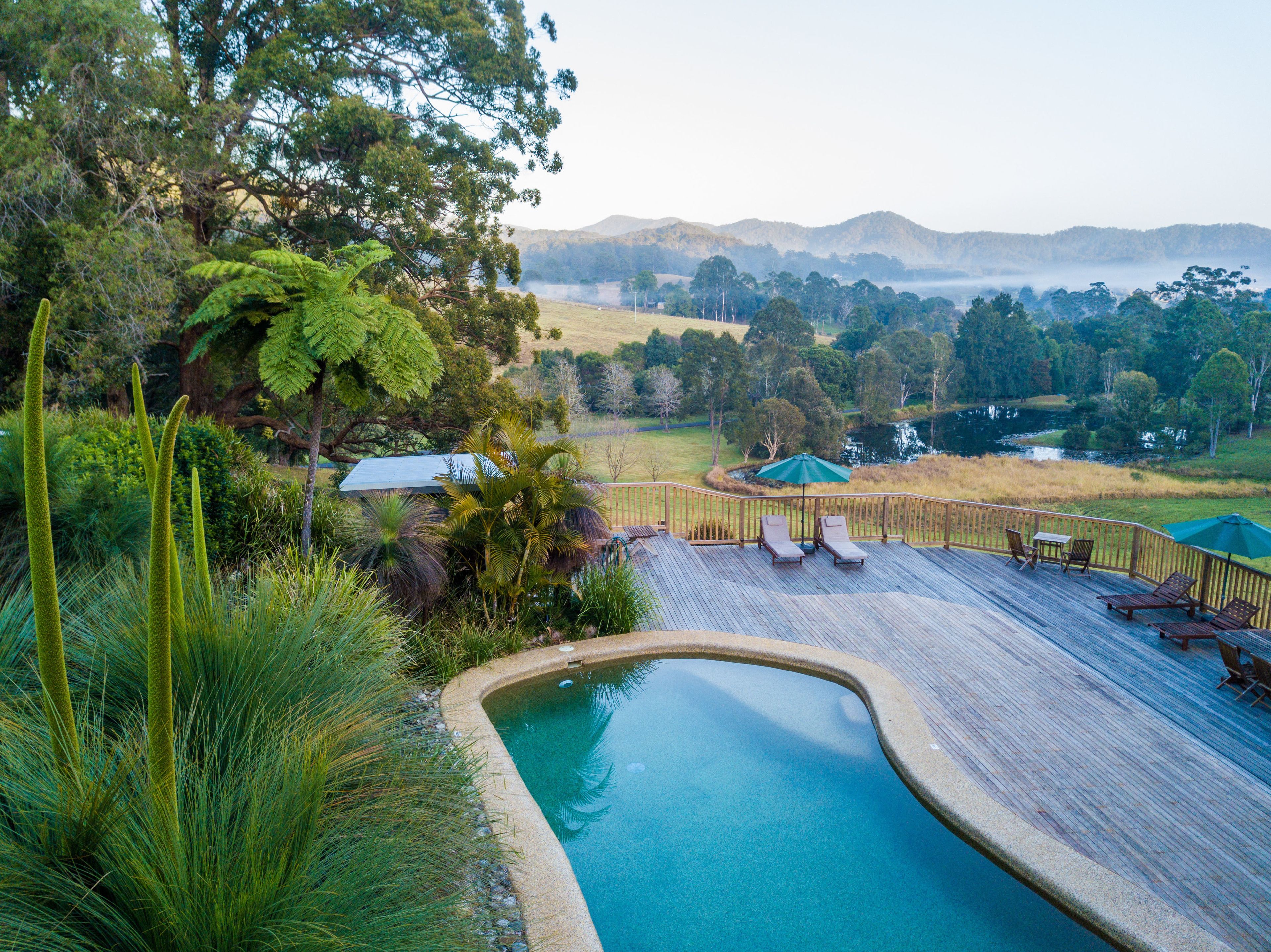 Outdoor pool, pool umbrellas, sun loungers