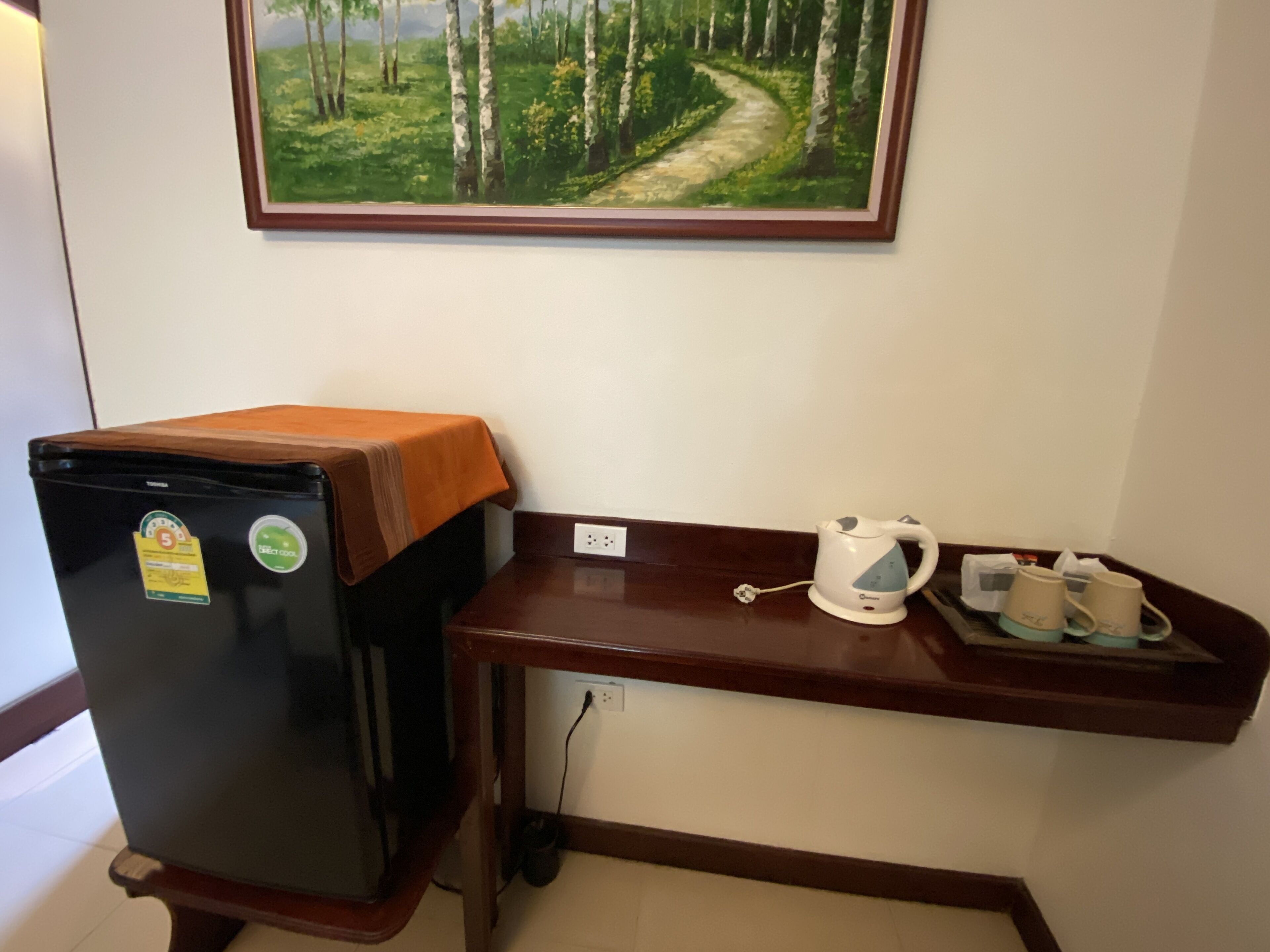 deluxe double room, pool view | mini fridge