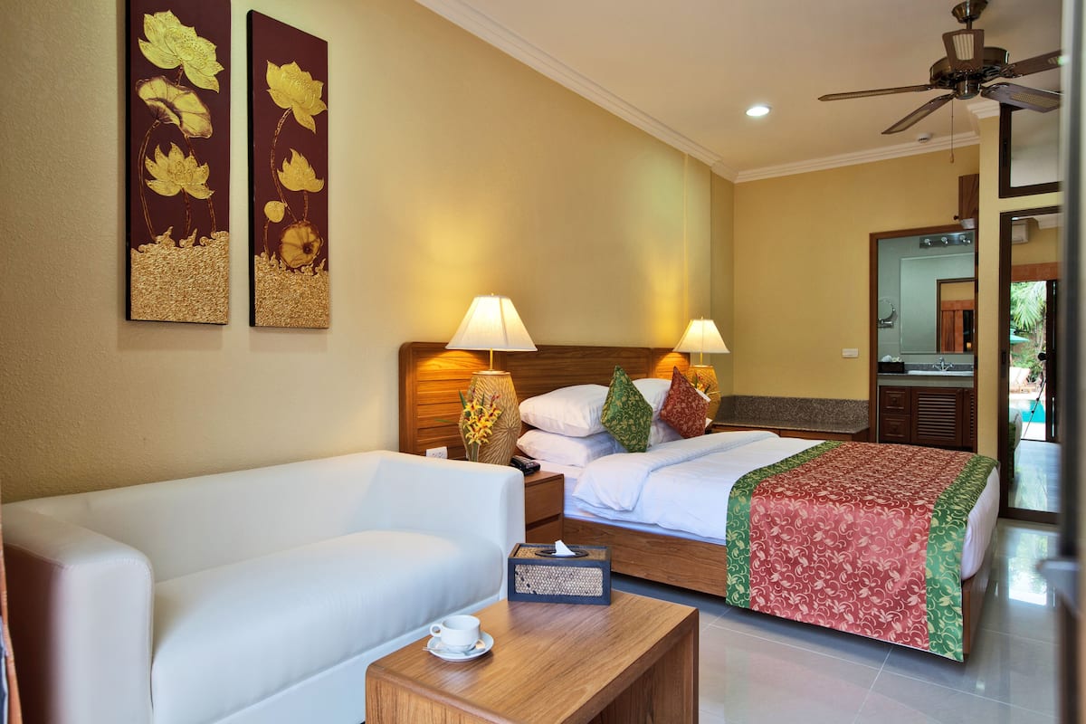 Standard Room (Pool Side) | Living area | LCD TV, DVD player