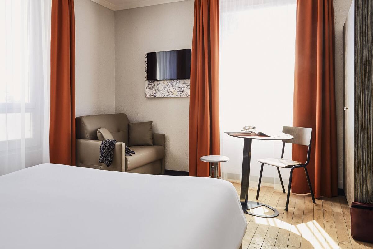 premium bedding, desk, blackout curtains, soundproofing