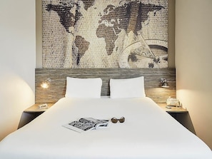 Premium bedding, desk, blackout drapes, soundproofing