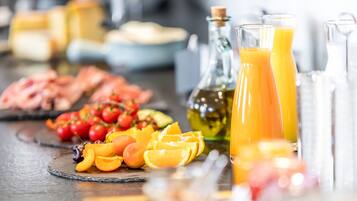 Daily buffet breakfast (CHF 19 per person)