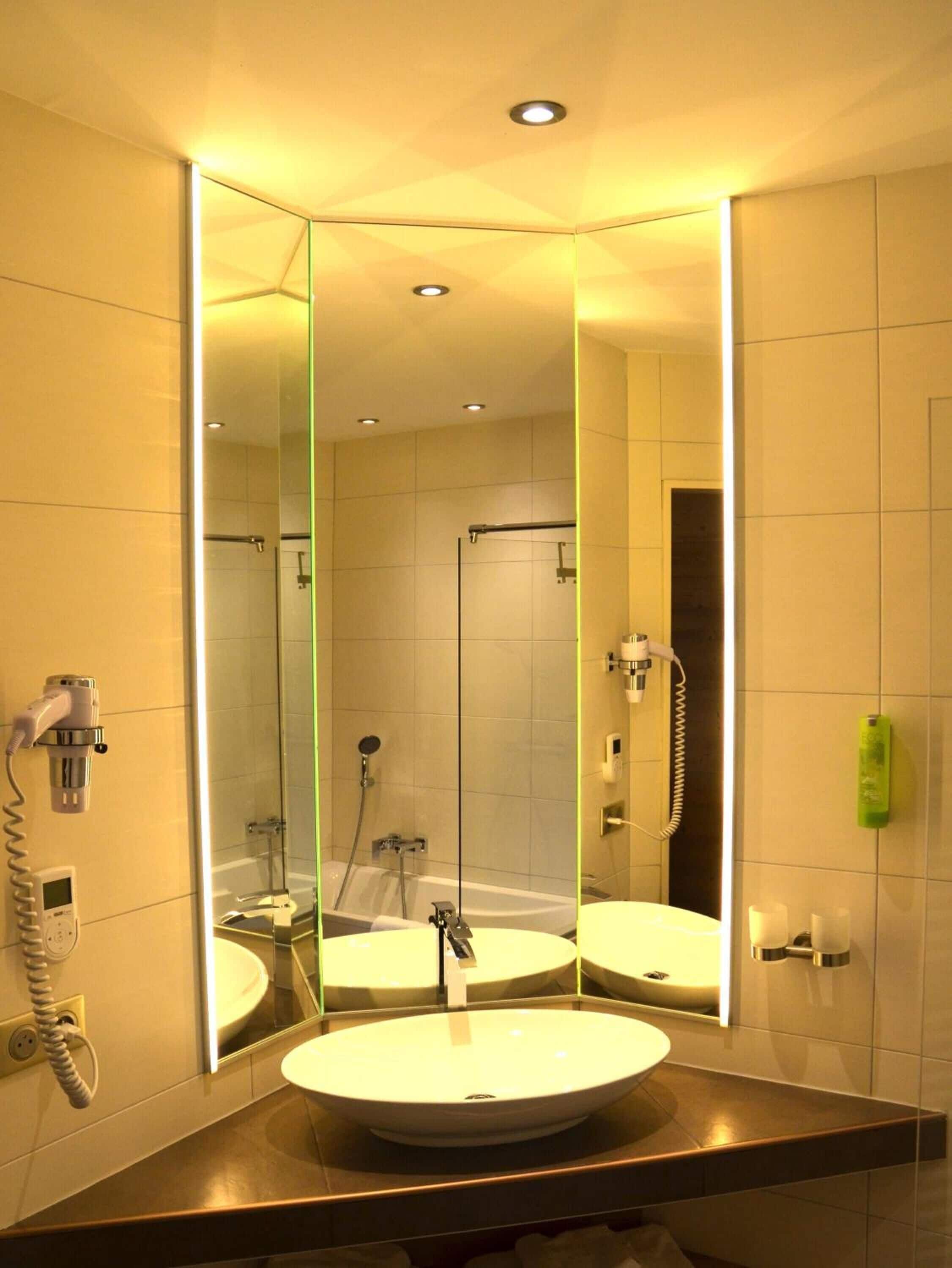 shower, rainfall showerhead, hair dryer, towels