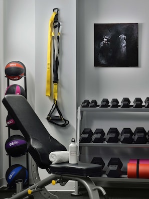 Stay fit and focused in our well-equipped gym, featuring a range of exercise equipment and accessories.