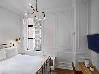 Premium bedding, pillowtop beds, in-room safe, individually decorated at Life Hotel New York