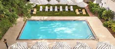 Outdoor pool, open 8:00 AM to 10:00 PM, pool umbrellas, pool loungers