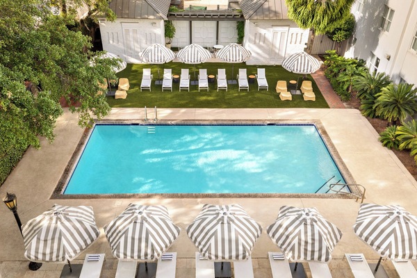 Outdoor pool, open 8:00 AM to 10:00 PM, pool umbrellas, sun loungers