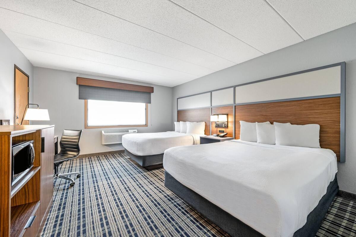 Room, 2 Queen Beds, Non Smoking | In-room safe, desk, laptop workspace, blackout drapes