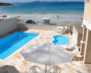 Outdoor pool, open 9 AM to 8 PM, pool umbrellas, sun loungers