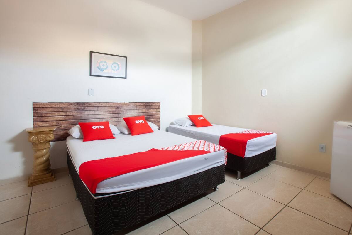 Triple Room, Multiple Beds | Minibar, bed sheets