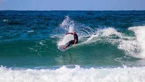 A surfer riding a wave.