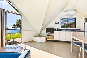 2 Bedroom Beachfront | Living area | Flat-screen TV, DVD player