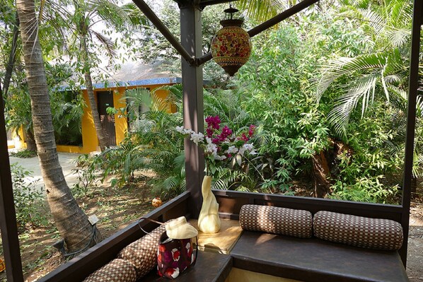 Cottage Deluxe, 1 giường đôi, quang cảnh vườn, khu vực vườn | Ban công