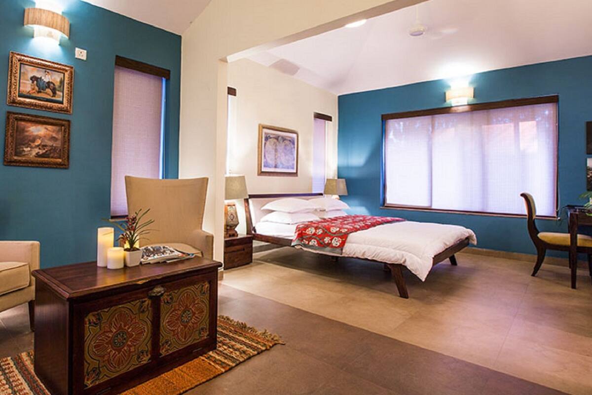 Cottage Deluxe, 1 giường đôi, quang cảnh vườn, khu vực vườn | 1 phòng ngủ, bộ đồ giường cao cấp, bàn, màn/rèm cản sáng
