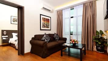 Family Suite | Living room | LCD TV